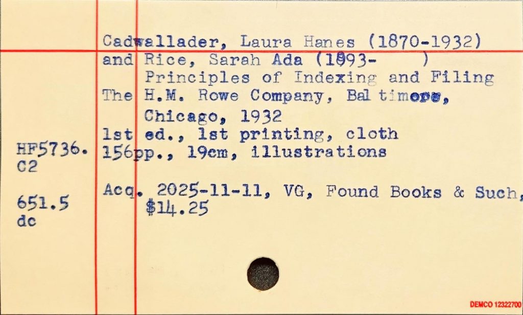 Yellow library index card with red lines and typed book details for Principles of Indexing and Filing.
