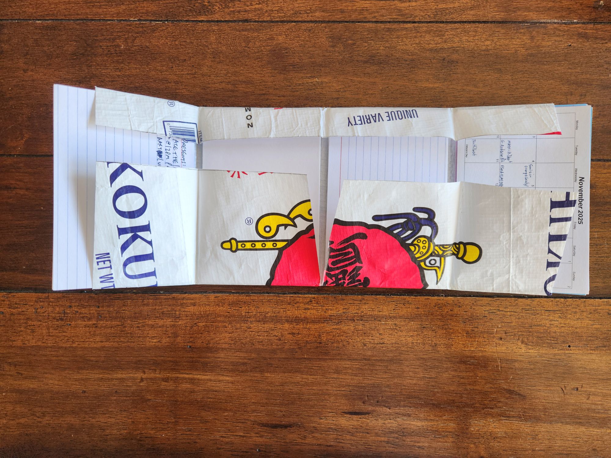 Plastic rice bag cut into a 4-sectional wallet for holding index cards.