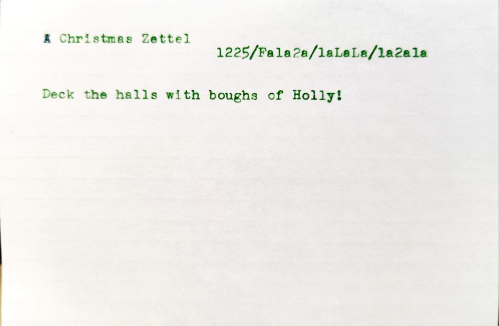 A 4x6" lined index card with the title: A Christmas Zettel. It has a Luhmann-artig number identifier: 1225/Fa1a2a/1aLaLa/1a2a1a which looks suspiciously like the Fa La La portion of a famous Christmas song. The body of the note reads: Deck the halls with boughs of holly.