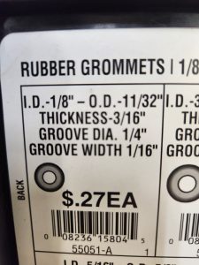 Printed label with the specs of the Hillman 55051-A rubber grommet printed on it above a bar code.